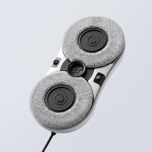 Two round microfibre pads on the underside