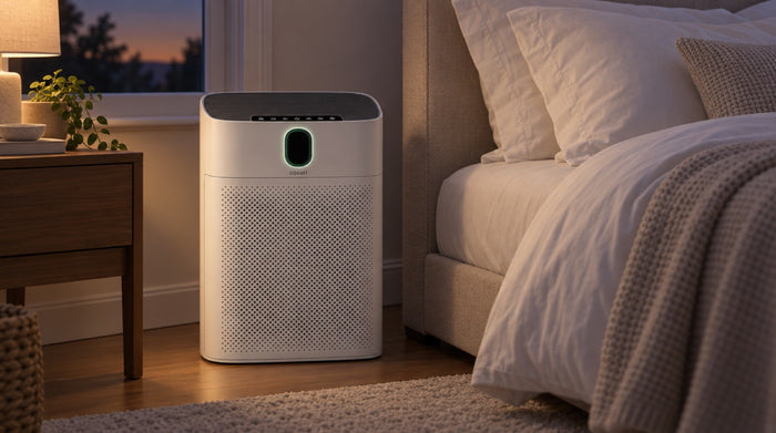 Cosari ClearAir 300 beside a bed at night with the display off